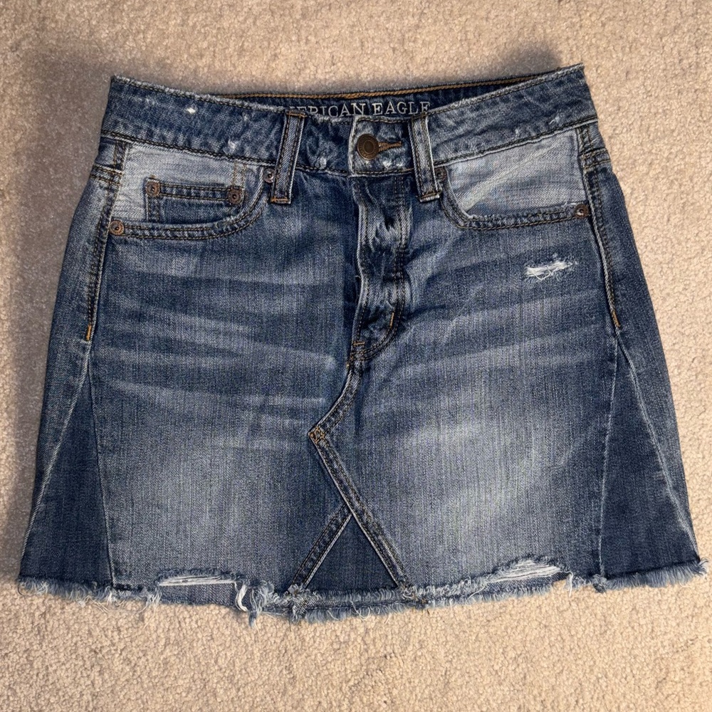 American Eagle Outfitters — Distressed Frayed Hem Denim Mini Skirt